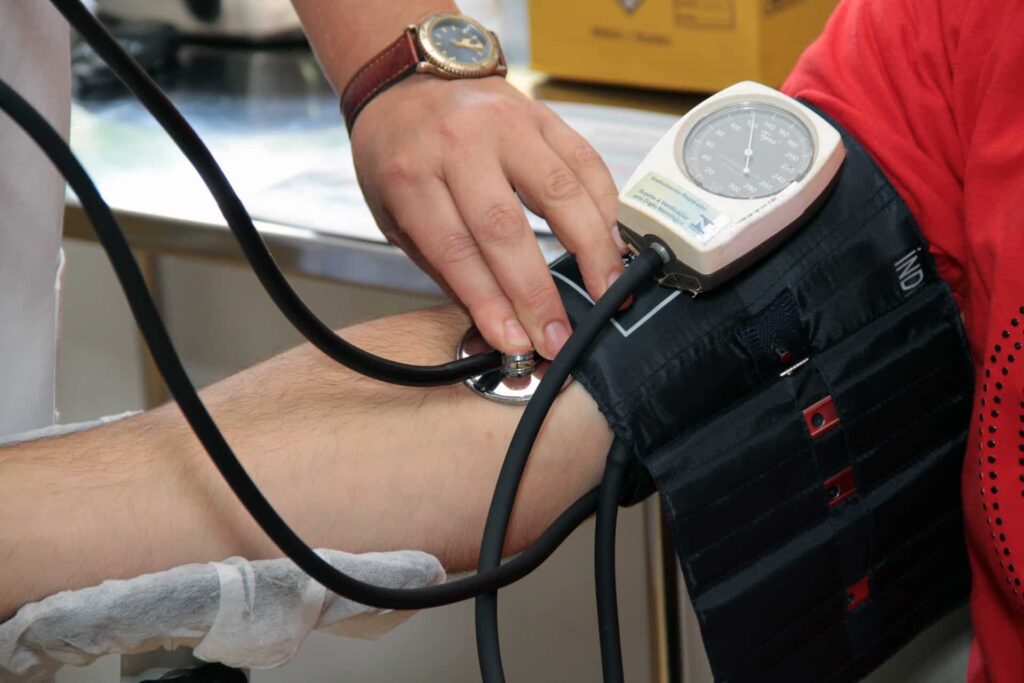 A person getting their blood pressure measured.