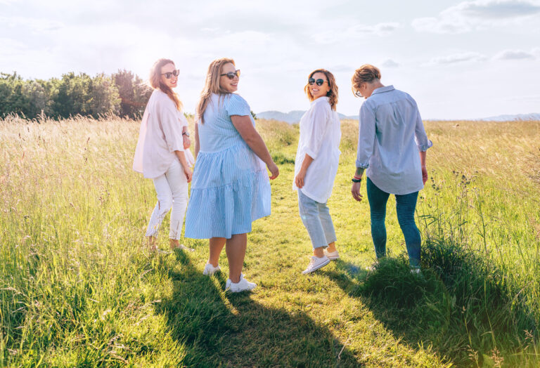 four middleaged women walking for sciatica.