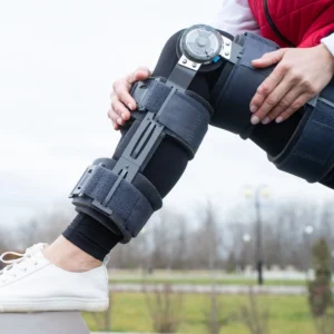 A person wearing a foot brace.