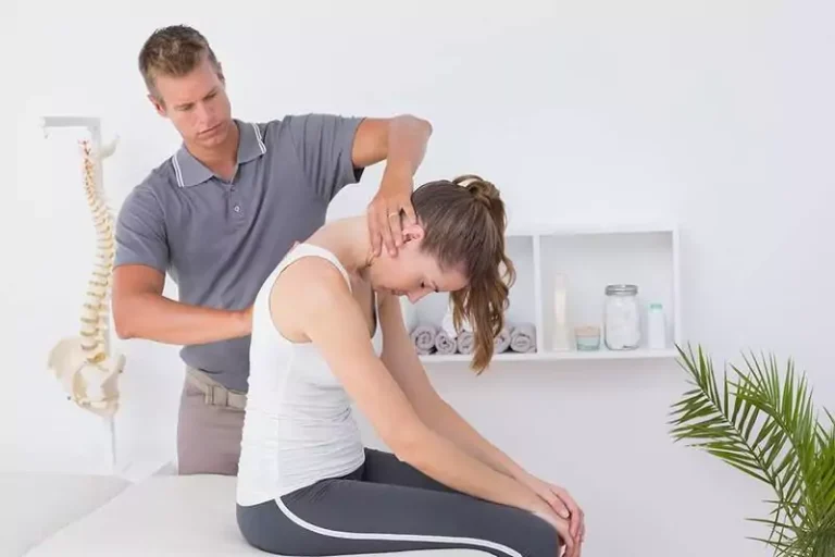 A woman being treated in her neck.