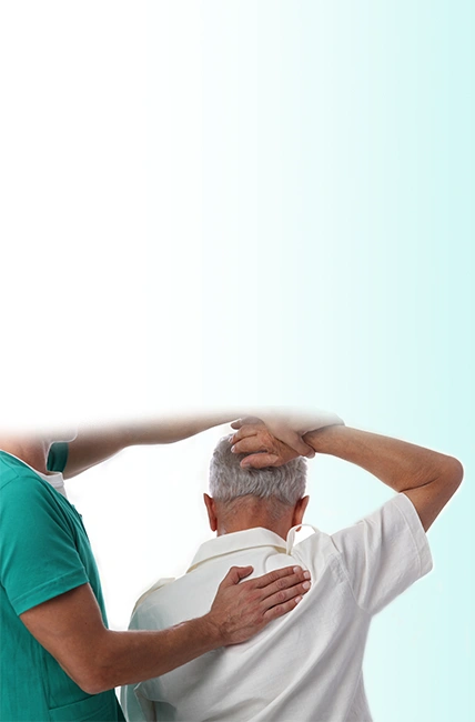 An elderly person receiving care for arthritis from a chiropractor.