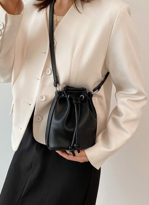 Black Mini Faux Leather Drawstring Bucket Bag | Baek Seok Ryu - Love Next Door