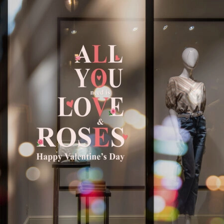 Shop windows and mannequins. Fashion Store exterior. City Night