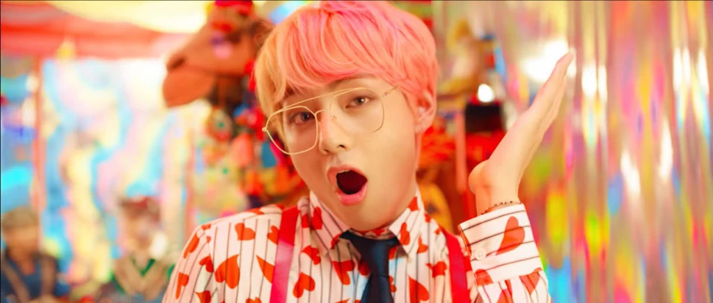 BTS Taehyung wearing striped heart blouse in IDOL MV