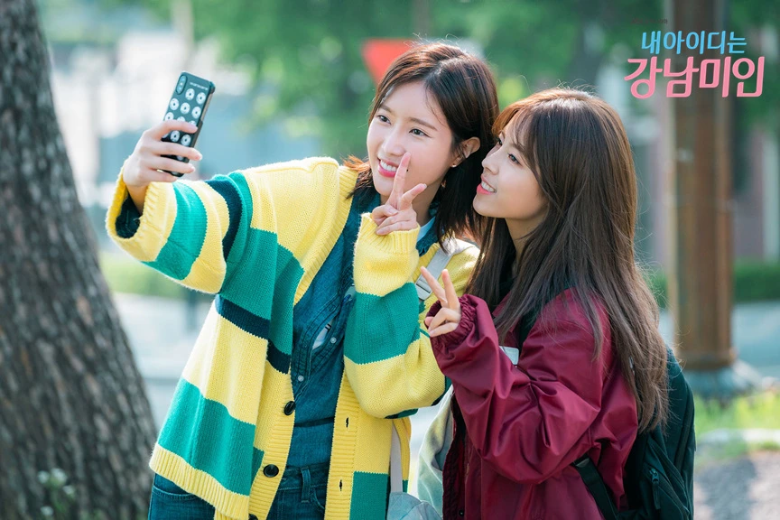 Kang Mi Rae wearing the yellow and green striped Cardigan