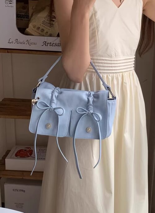 Sky Blue Mini Drawstring Bow Sling Bag | Wonhee - ILLIT