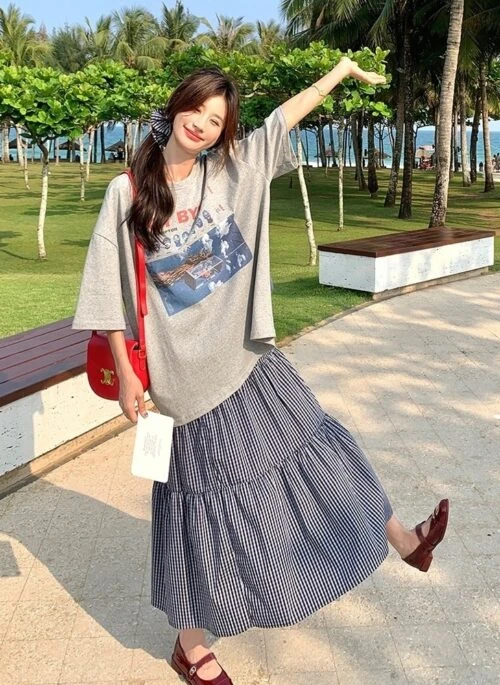 Plaid Skirt And Printed Tee Casual Outfit Set