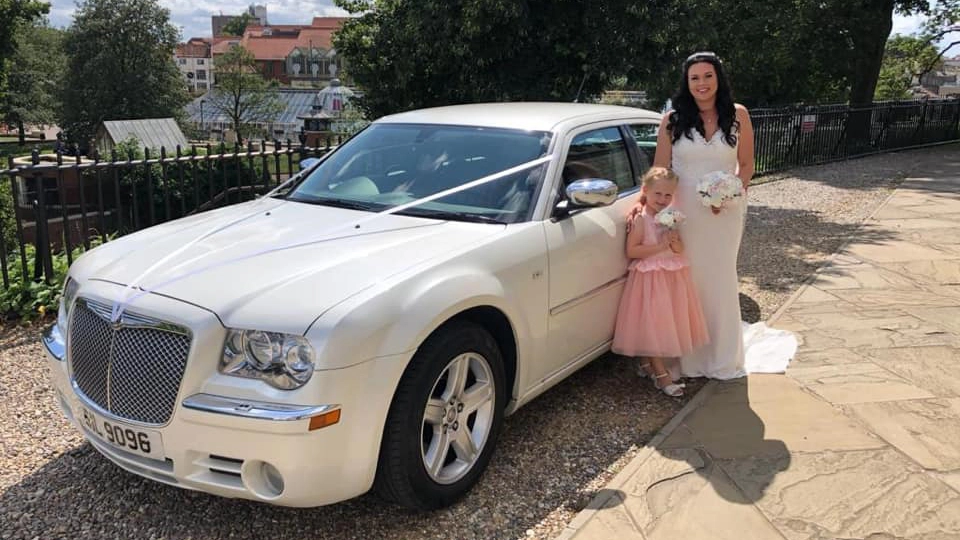 White Modern Chrysler 300c saloon car