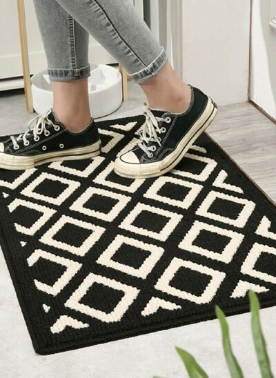 Black and White Rug with Harlequin Pattern